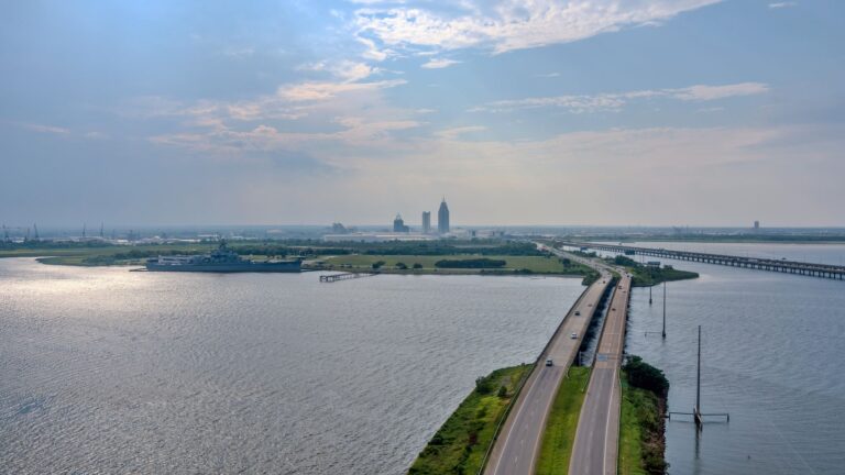 Mobile Bay in August with the Mobile, Alabama skyline in the distance